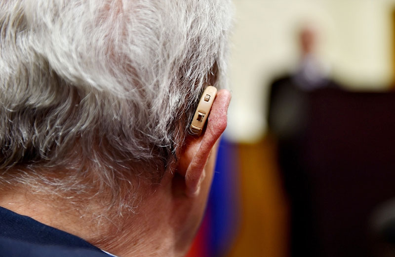 Image of a person using a hearing aids