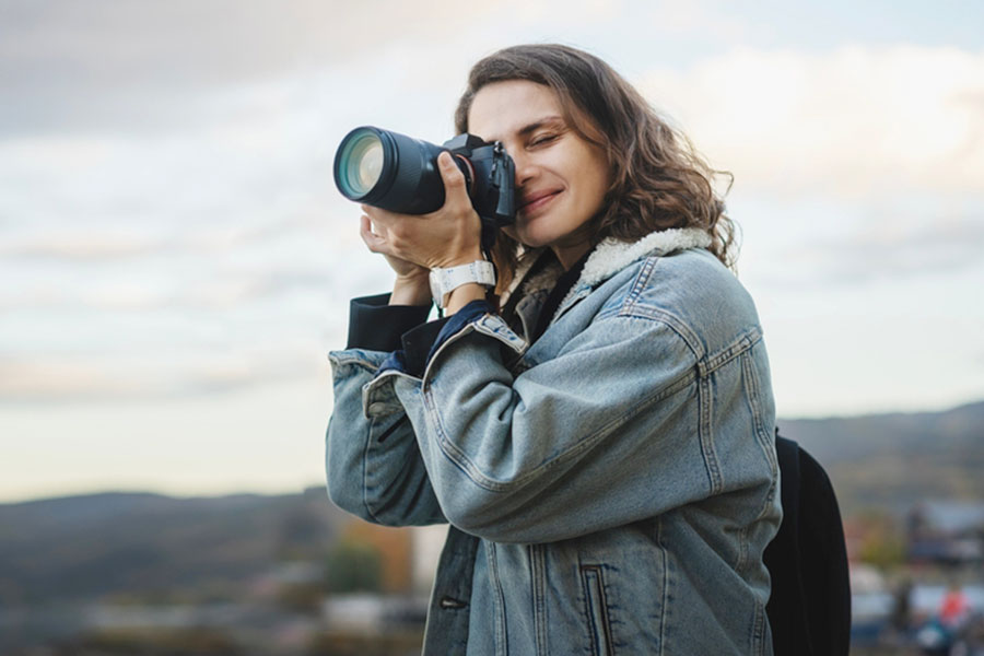 Image of a women holding a camera